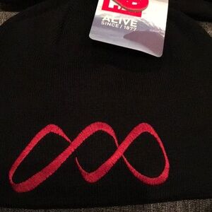 Helly Hansen Black Beanie with Red Logo 
Only One NWT